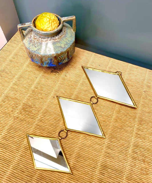 Guirlande de miroirs dorés