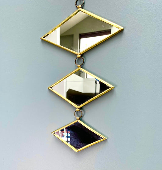 Guirlande de miroirs dorés